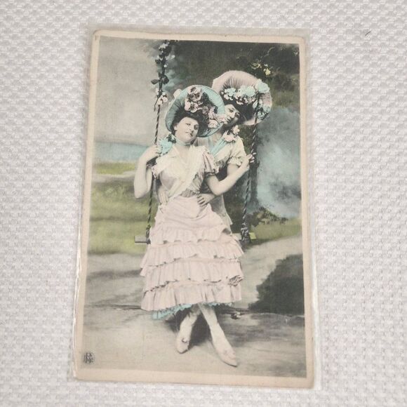 Antique Postcard Victorian Colorized 2 Women Flowered Hats On Swing 1909 - Picture 1 of 3